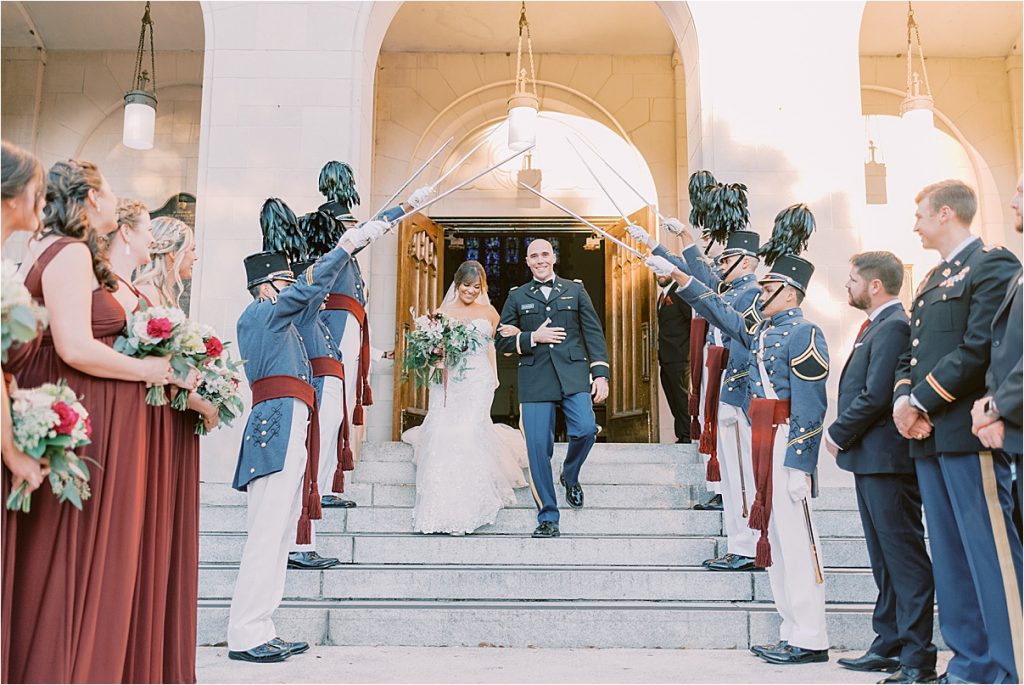 bride and groom leaving their wedding ceremony charleston wedding at the the citadel summerall chapel